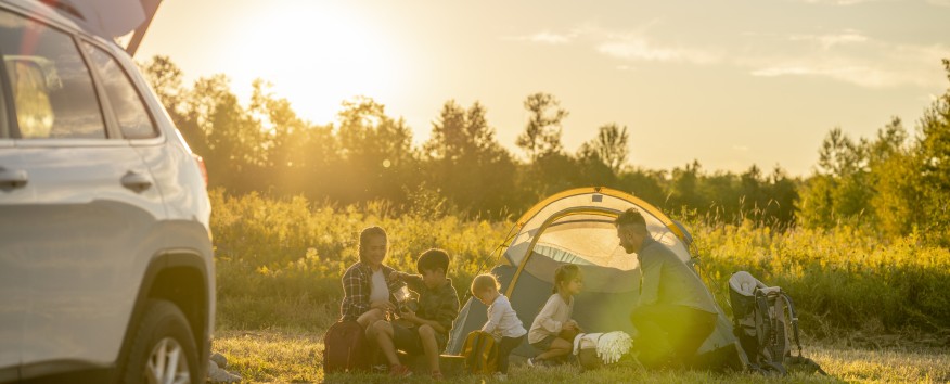 Little kids sitting camping