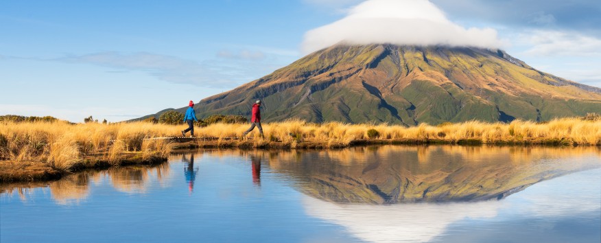 People walking by the mountain