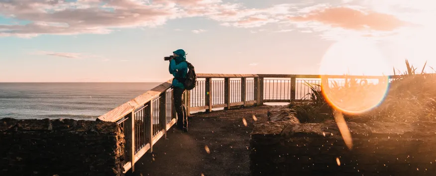 Man taking photo of balcony