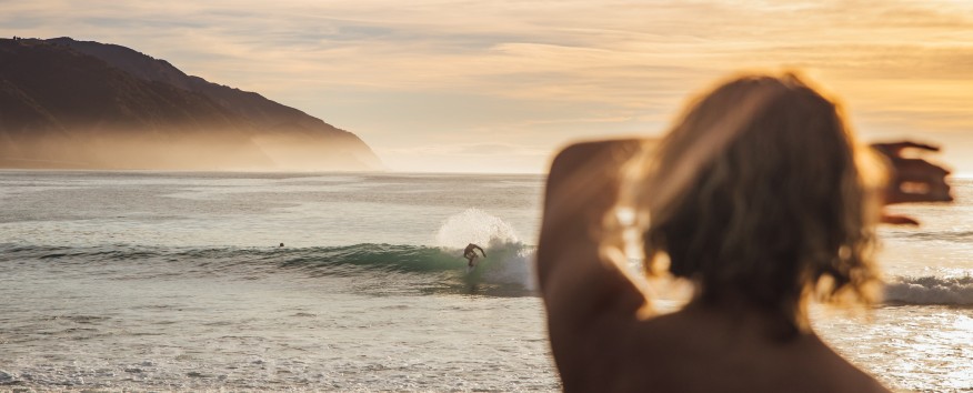 Women looking out to wave