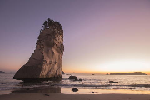 Tall rock formation on a beach
