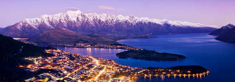 Queenstown aerial view at night with mountains
