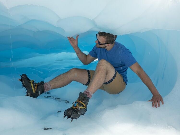 Man climbing on a glacier