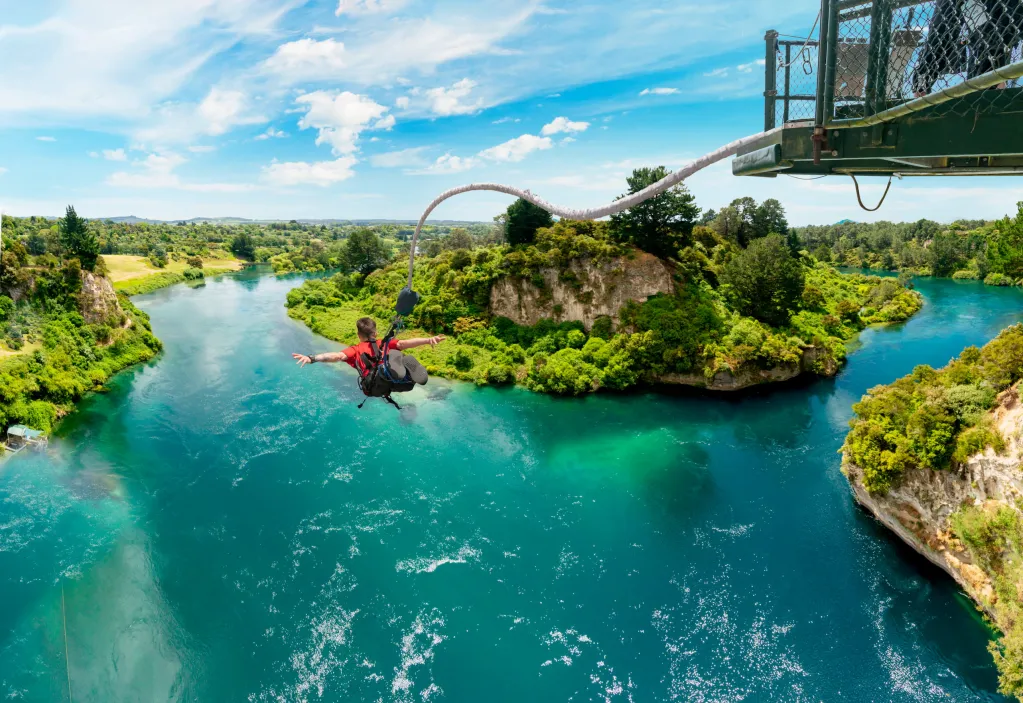 Taupō Bungy jumping person over lake