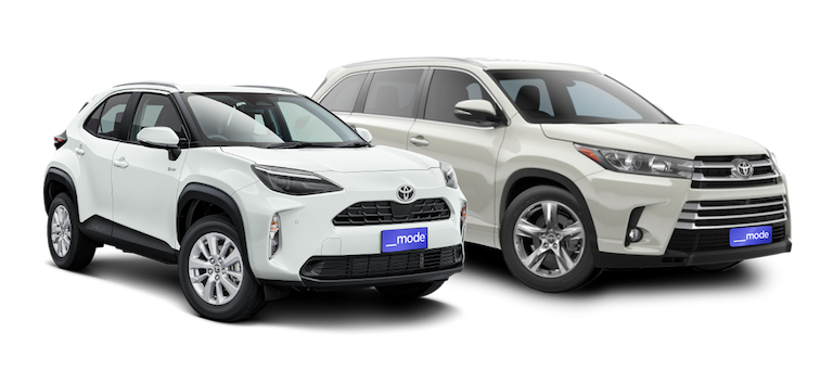 Two Toyota SUVs side by side
