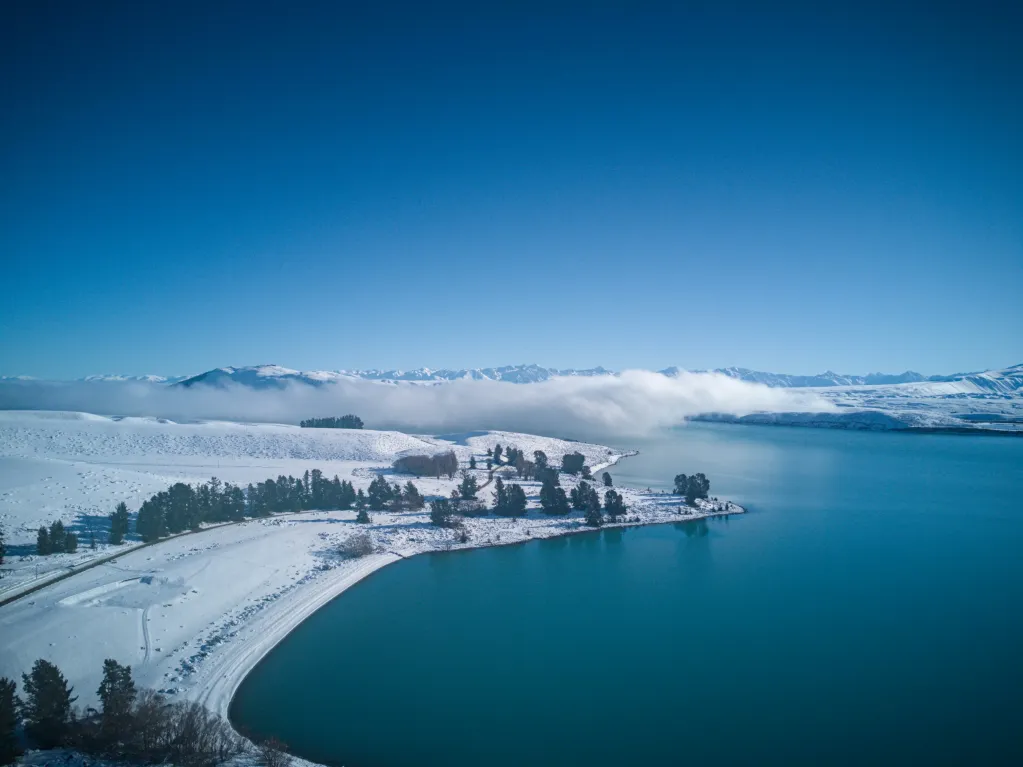 Snow on lake tekapo