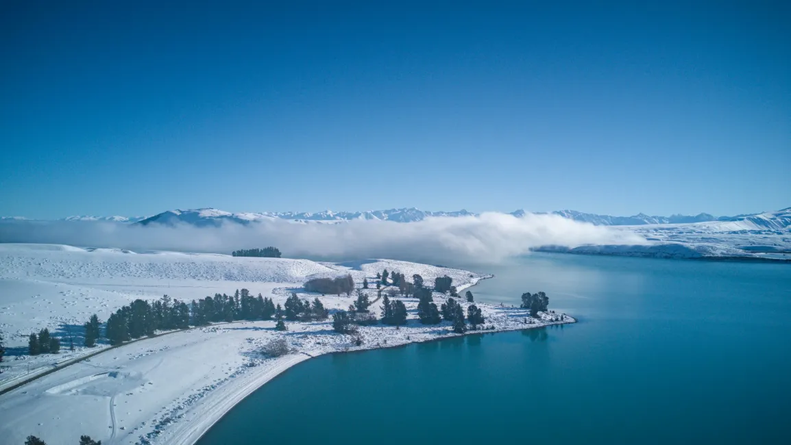 Snow on lake tekapo